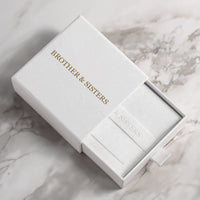 Thumbnail for Sun Photo Necklace packaging by Brother & Sisters, elegant white box with gold lettering, perfect for gift-giving.