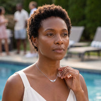 Thumbnail for Woman gently touching her silver necklace | SKU: 42002-silver