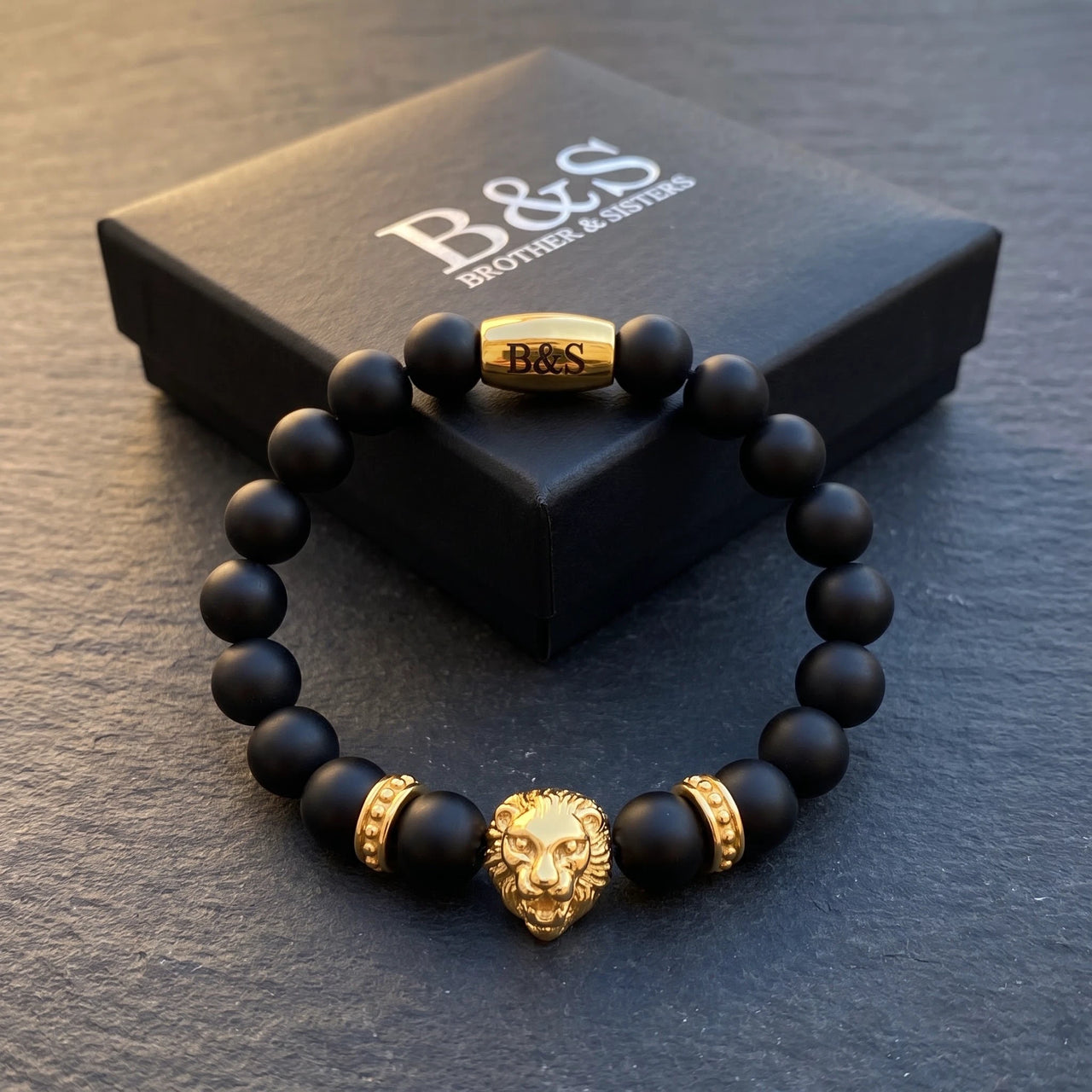 Gold Lion & Black Stones Bracelet – in the Brother & Sisters gift box | Brother & Sisters | SKU: 20712286-gold-XS-14-15, 20712286-gold-S-16-17, 20712286-gold-M-18-19, 20712286-gold-L-20-21, 20712286-gold-XL-22-23