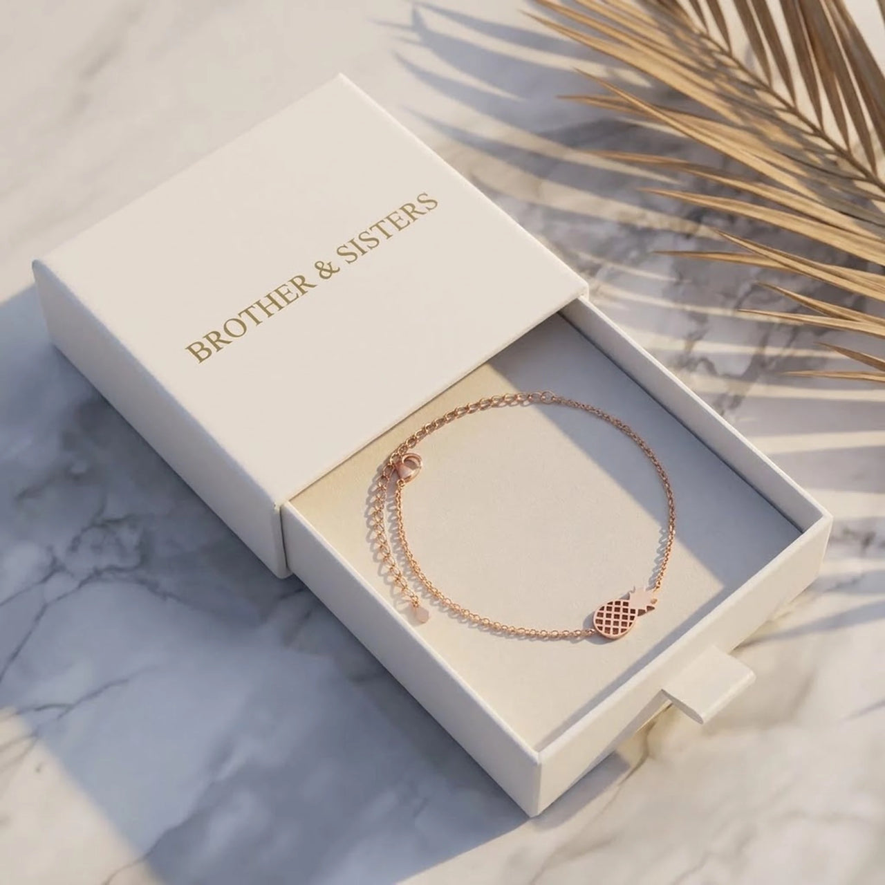 Rose gold charm bracelet in the Brother & Sisters gift box | SKU: 9178613-rose-gold