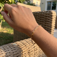 Thumbnail for The Original bracelet in gold worn, showing its real size | SKU: l-original