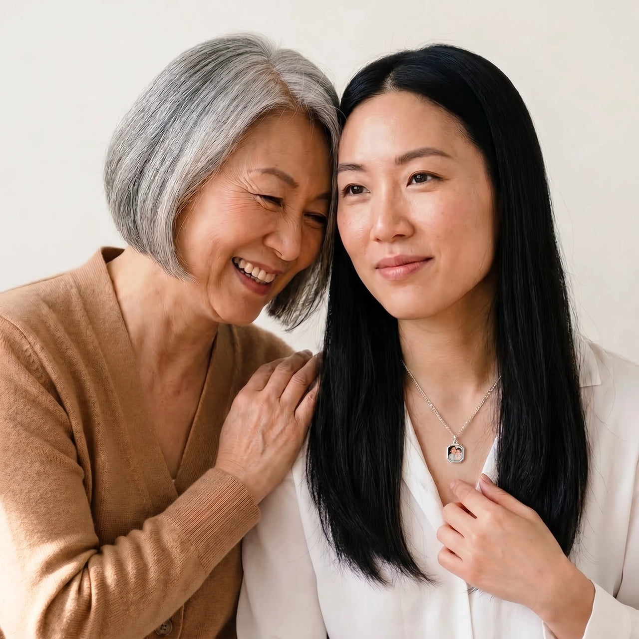 Mother and daughter sharing the photo hidden in the silver octagon necklace | SKU: TPH-OCTN-SILVER
