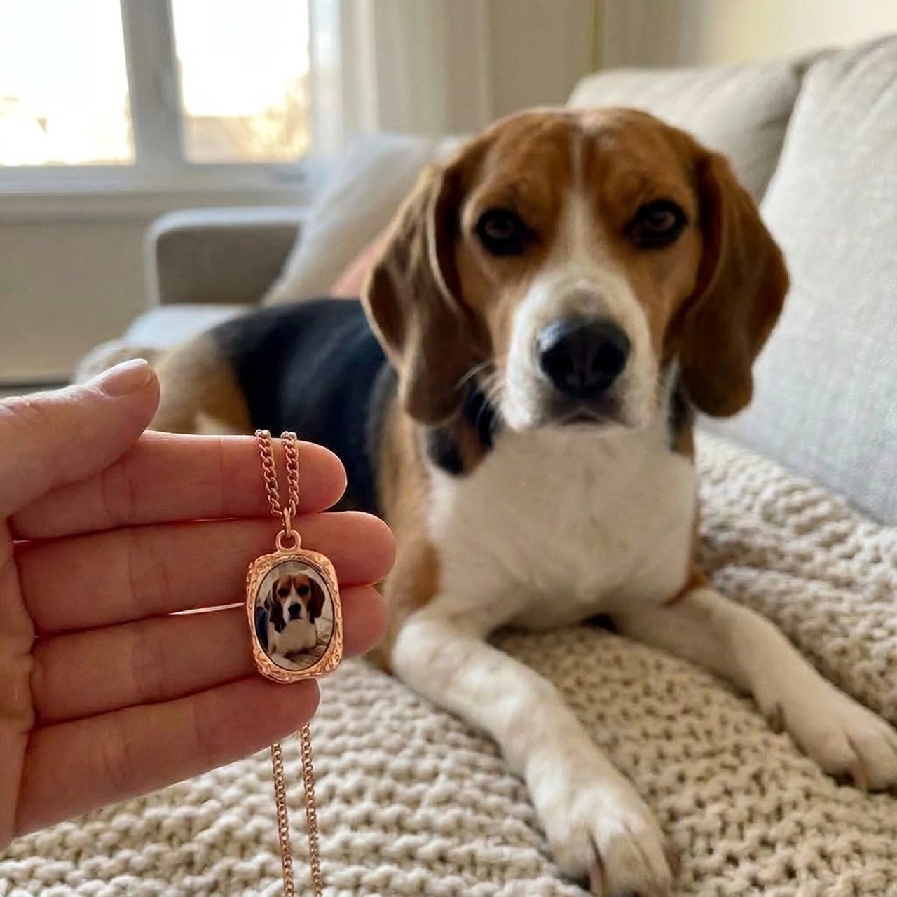 Customer photo: the rose gold oval necklace with her beagle's photo, her dog in the background | SKU: TPH-OVLN-ROSEGOLD